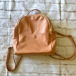 Beautiful Coach and Four pink leather backpack
